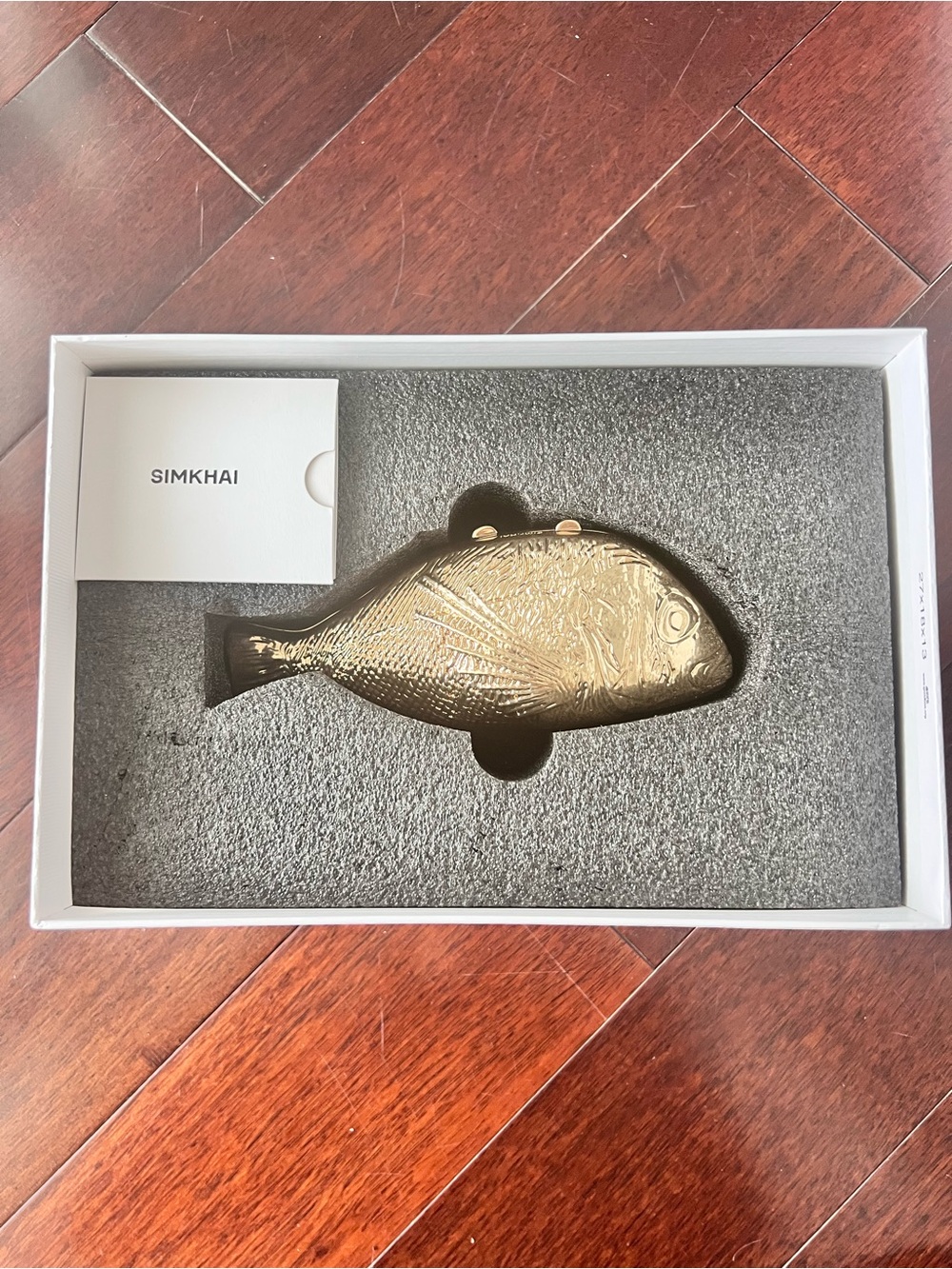 SIMKHAI Gold Fish Clutch Wristlet